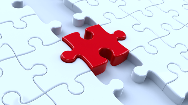 Puzzleteil symbolisiert Bindeglied von IT-Outsourcing für KMU in Zürich